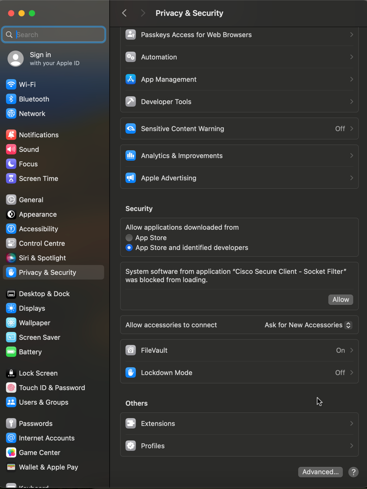 MacOS System Settings - Privacy & Security - Security. A text that says "System software from application Cisco Secure Client - Socket Filter was blocked from loading" is displayed. An allow button is shown.
